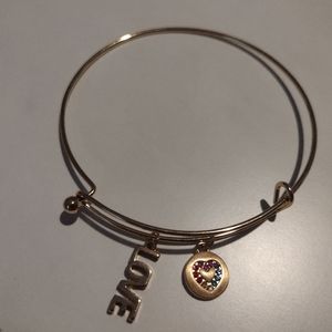 Bracelet gold tone and beautiful multicolor stones with love